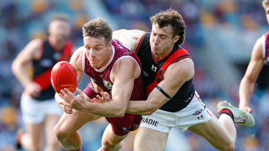 Andy McGrath tackles Lincoln McCarthy.