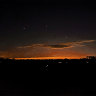 Points of light appear in the evening sky near Lebanon Township, New Jersey.