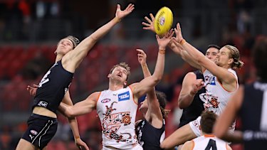 Harry Himmelberg attempts to mark.
