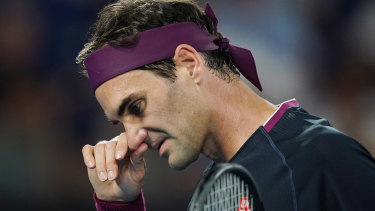 Roger Federer is out of the Australian Open  after battling injury during his semi-final match against Novak Djokovic.