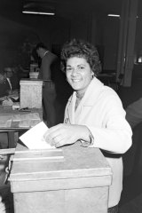 An Aboriginal woman casts her vote during the 1967 referendum at polling booth at Sydney Town Hall. 