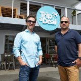 TripADeal co-founders Richard Johnston (left) and Norm Black in Byron Bay.