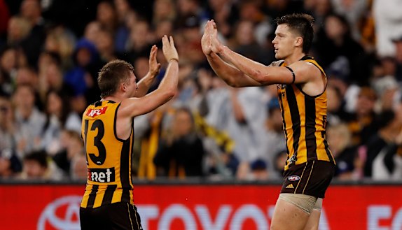 Dylan Moore (left) and Mitch Lewis are key members of the Hawks’ forward line.