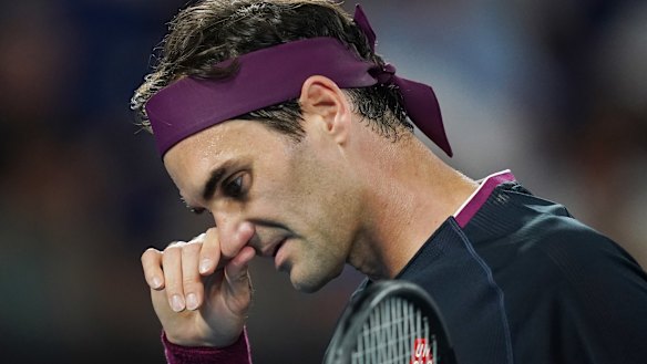 Roger Federer is out of the Australian Open  after battling injury during his semi-final match against Novak Djokovic.