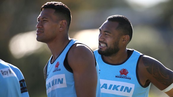 Bond: Former Waratahs teammates Israel Folau and Sekope Kepu.