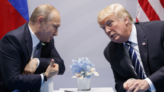 US President Donald Trump meets briefly with Russian President Vladimir Putin at the G20 Summit in Hamburg last year.