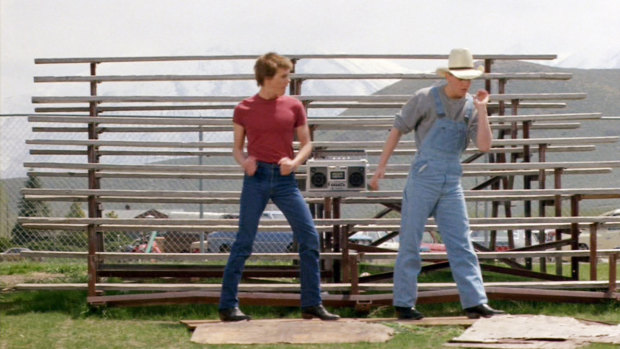 Christopher Penn gets some pointers from Kevin Bacon in Footloose.