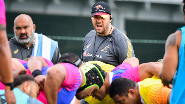 Laying down the law: Michael Cheika oversees a scrum session in Tokyo. 