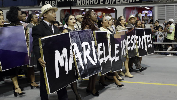 Dancers from the Vai-Vai samba school pay homage to the slain councilwoman Marielle Franco during Carnival.