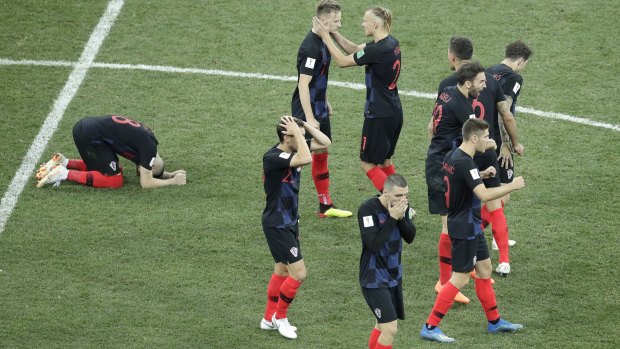 Croatians players react during their shootout against Denmark,