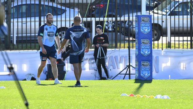 Steady progress: Boyd Cordner goes through some sprint drills at Coogee Oval on Friday.