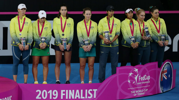 Commiserations: Team Australia accept their trophies after losing the decider against France.