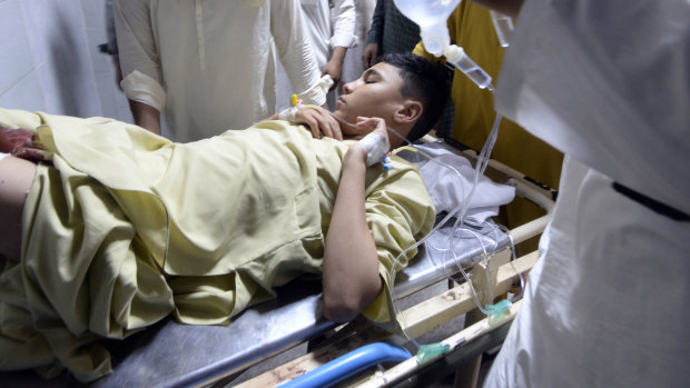 Suicide bomber kills dozens at political rally in northwest Pakistan