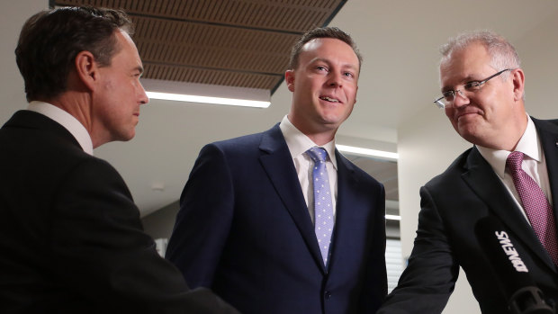 Federal Member for Dunkley, Chris Crewther (centre).