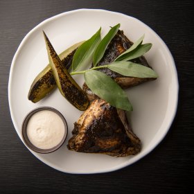 Barbecued kingfish collar with cucumber and smoked yoghurt. 