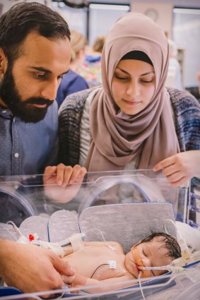 Danial Khan with his wife Benish and daughter Amelia, who was left with brain damage after she was mistakenly given nitrous oxide instead of oxygen at Bankstown-Lidcombe Hospital in June 2016.