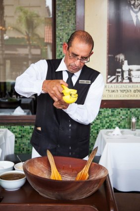 Caesar salad is prepared table-side at
Caesar's Restuarante, Tijuana.