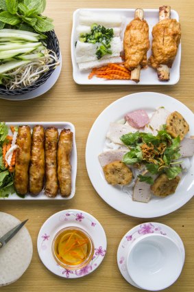 Cabramatta dining: Spring rolls, sugar cane prawns, fresh rice pastry and accompanying fresh herbs and dipping sauce.