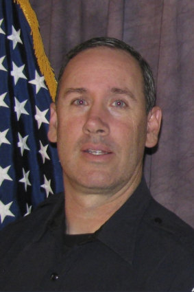 Killed: Officer Eric Talley was first on the scene.