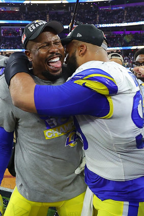 Von Miller and Aaron Donald of the Rams embrace.