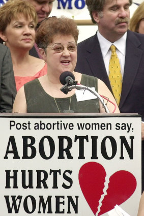 McCorvey addresses a large group of anti-abortion supporters in Dallas in 2003.