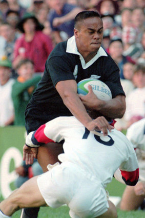 All Blacks winger Jonah Lomu charges through England fullback Mike Catt - and changes the game forever.