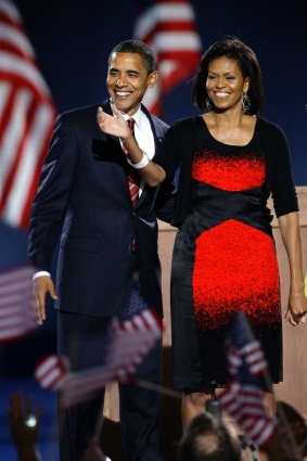 Historic win: Barack and Michelle Obama at an election night victory rally in Chicago, November 4, 2008. 