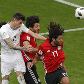Jose Gimenez heads Uruguay's winning goal against Egypt.