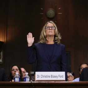 Christine Blasey Ford is sworn in before the Senate Judiciary Committee.