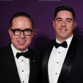 Qantas chief Alan Joyce and husband Shane Lloyd are sticking to the high-rise life at The Rocks.