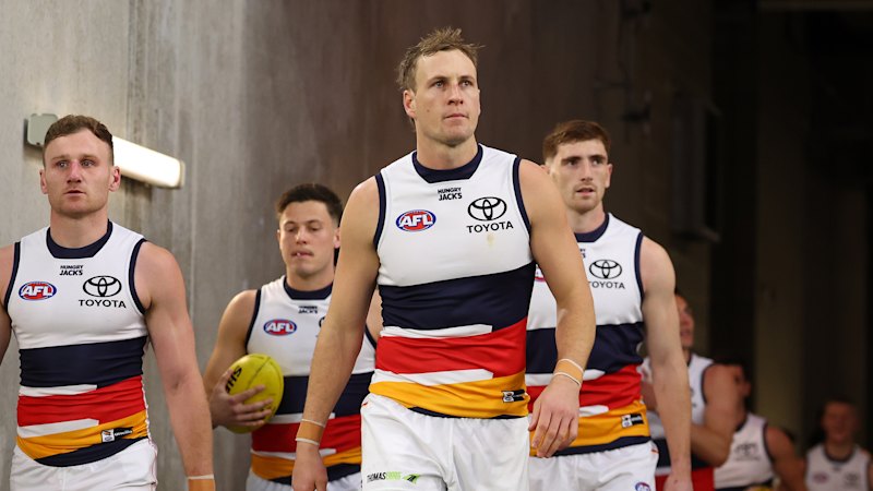 Crows call in police, AFL after ‘disgusting’ message sent to Jordan Dawson