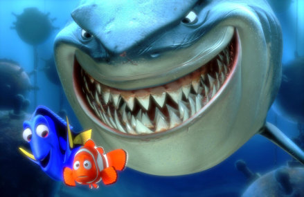 Dory, lower left, and  Marlin, lower right, face an ocean full of perils in their efforts to rescue Nemo, in this scene from <i>Finding Nemo</i>.