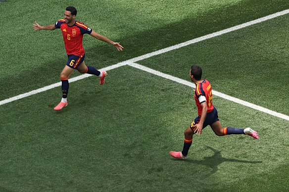 Mikel Merino celebrates scoring the match winner.
