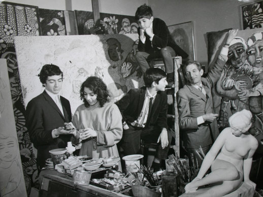The Mora family in Mirka’s Studio at Tolarno in 1967. From left to right: Philippe, Mirka, William, Tiriel (on ladder) and Georges