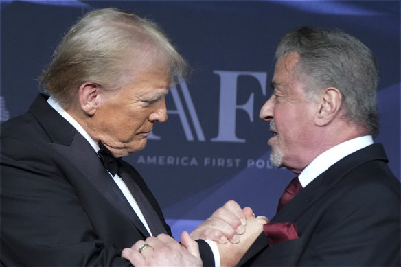 Donald Trump greets actor Sylvester Stallone during the gala. 