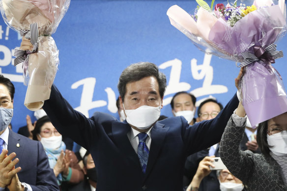 Lee Nak-yon, a former prime minister and candidate of the ruling Democratic Party, celebrates after the election.