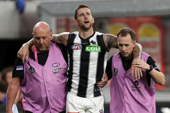Jeremy Howe is helped from the field on Friday.