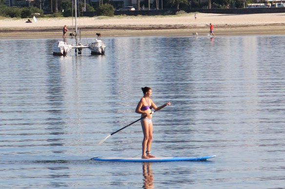 A paddleboarder in St Kilda. 
Novices have been warned to learn how to use paddleboards safely before heading out.