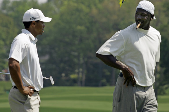 Michael Jordan chats with Tiger Woods at a pro-am event in 2007.  