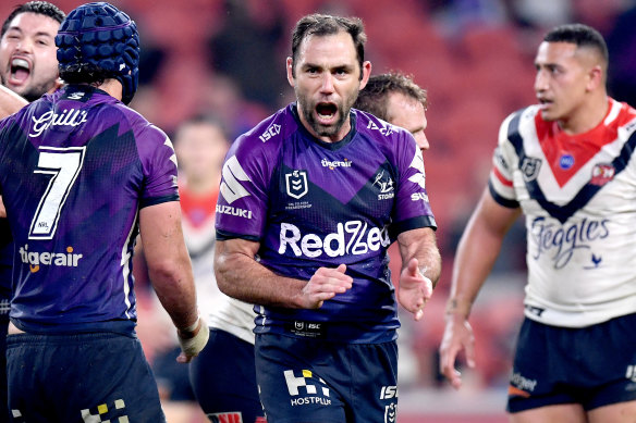 Cameron Smith celebrates the Storm's golden-point win against the Roosters in Brisbane on Thursday night.