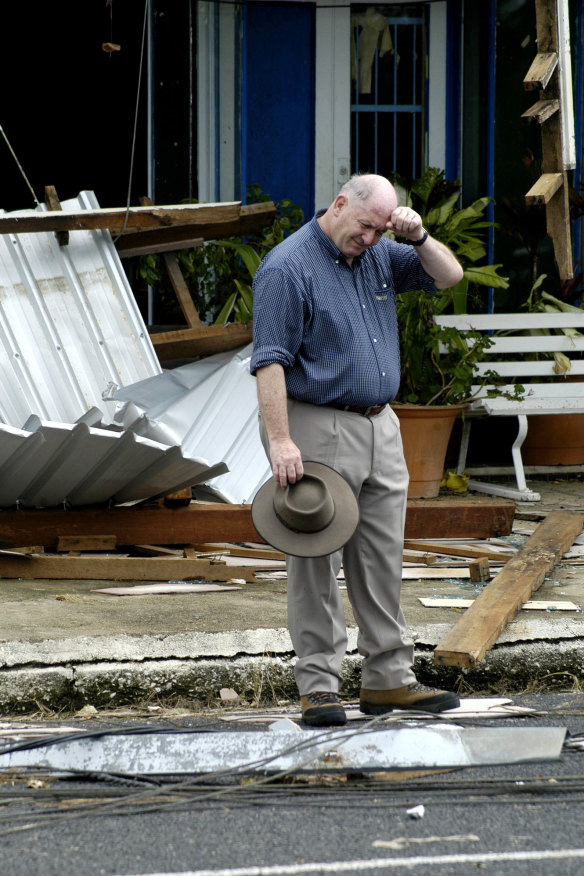 Sir Peter Cosgrove surveys damage after Cyclone Larry in Queensland in 2006.