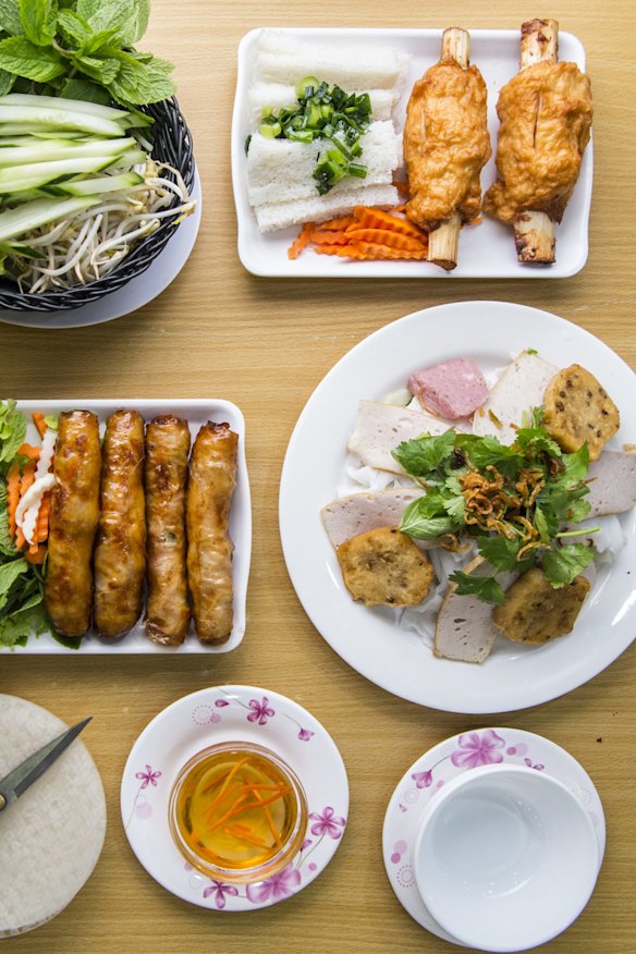 Cabramatta dining: Spring rolls, sugar cane prawns, fresh rice pastry and accompanying fresh herbs and dipping sauce.