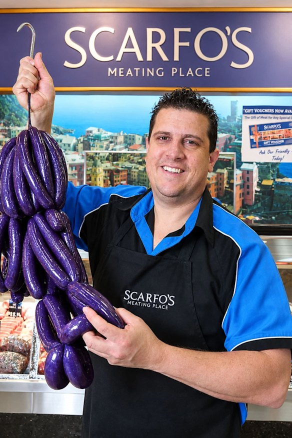 Tony Scarfo with his purple sausages.