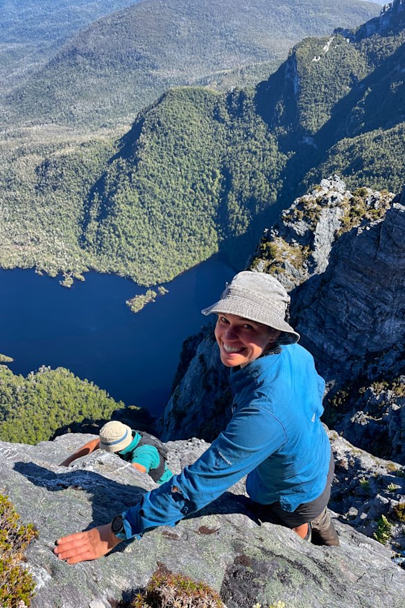 Becca Lunnon takes a break on Federation Peak in the Eastern Arthurs Range in Tasmania.
