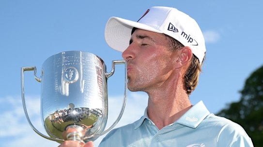 David Puig kisses the Joe Kirkwood Cup after winning the Australian PGA Championship.