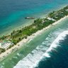 Funafuti, the capital of the island nation of Tuvalu, consists of strips of land encircled by a lagoon and the vast ocean.