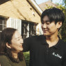 Cathy Cao with her son Jaclyn Yang at her home in Roseville.