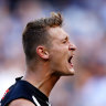 AFL teams and tips: Pies boost injury-hit forward line, Dees drop three for King’s Birthday blockbuster