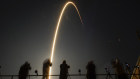 Photographers record images of a SpaceX Falcon 9 rocket with Intuitive Machines’ second lunar lander as it lifts off from pad 39A at the Kennedy Space Center in Cape Canaveral.