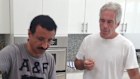 An undated photo shows Jeffrey Epstein, right, talking with Sultan Ahmed bin Sulayem.